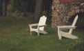 Outdoor chairs on lawn in backyard Money tight? Take a staycation