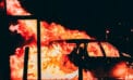 Burning car at racism protest Poverty often at the root of racism, hate